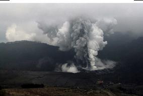 Mt. Usu belches black smoke